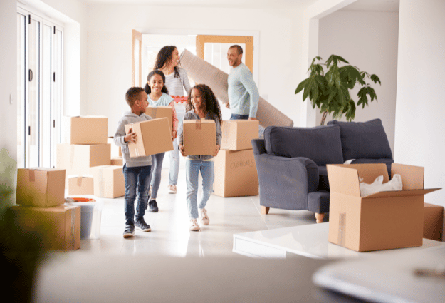 family entering new home in family-friendly neighborhoods in Spokane