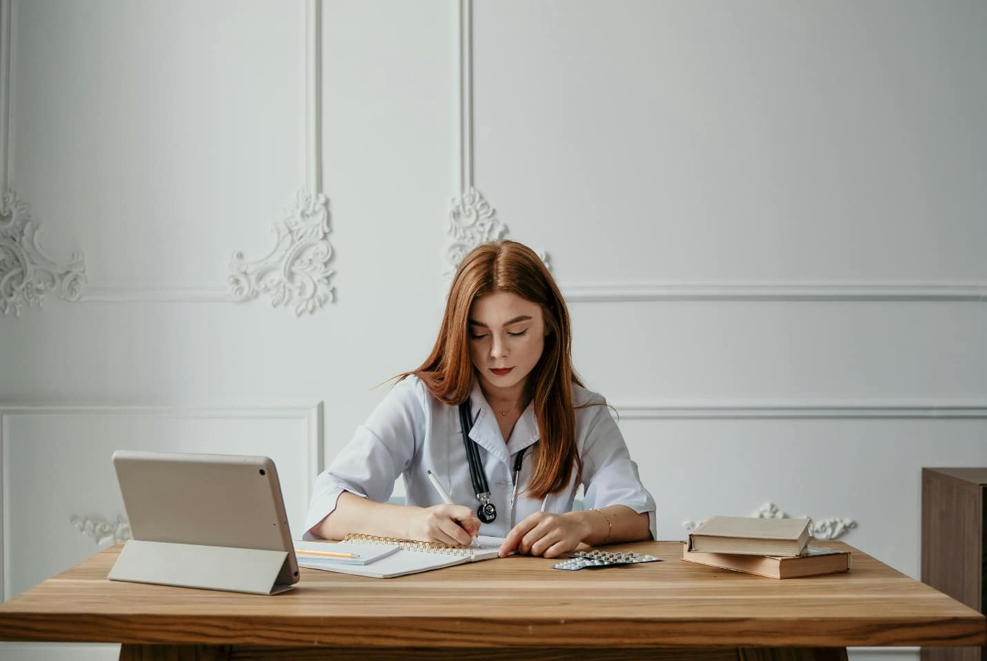 Doctor taking notes
