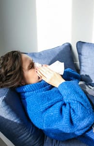 A woman with a sinus infection.