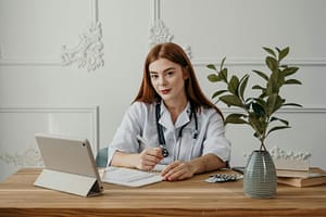 Doctor sitting in her office