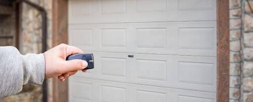 person opening garage door