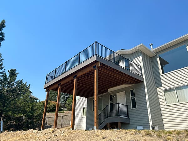 Discover our expertise in crafting tall custom decks using pressure treated lumber, Timbertech PVC decking, fascia, and Fortress FE26 handrails. Our ability to build decks at any height showcases our commitment to quality and precision.