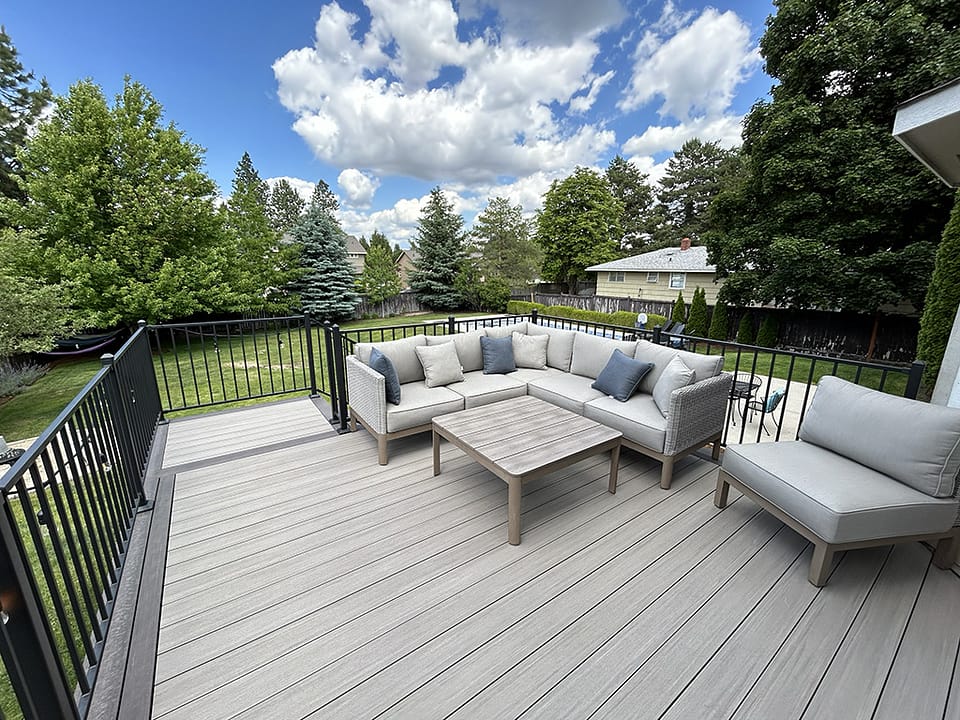 Beautiful back deck built in a picturesque and scenic backyard.