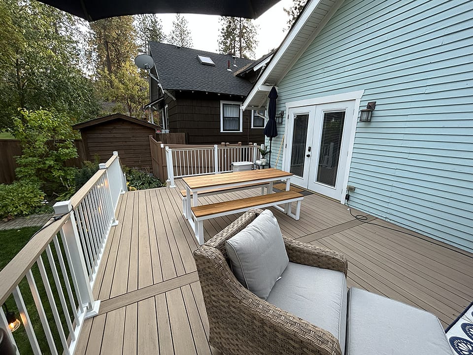 Back deck featuring a unique custom decking layout for added visual appeal.