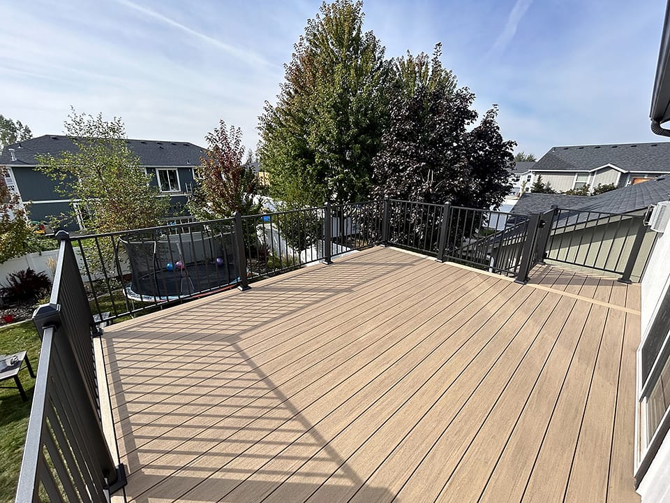 Composite back deck with a view of the backyard.