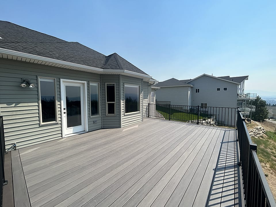 Composite back deck offering a durable and stylish outdoor space.