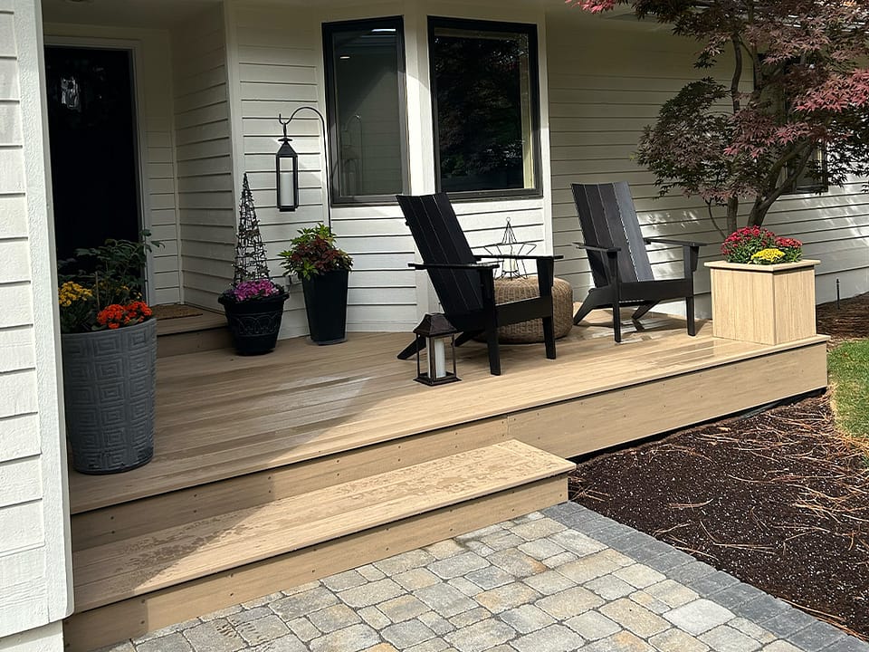 Front porch featuring a matching planter box.