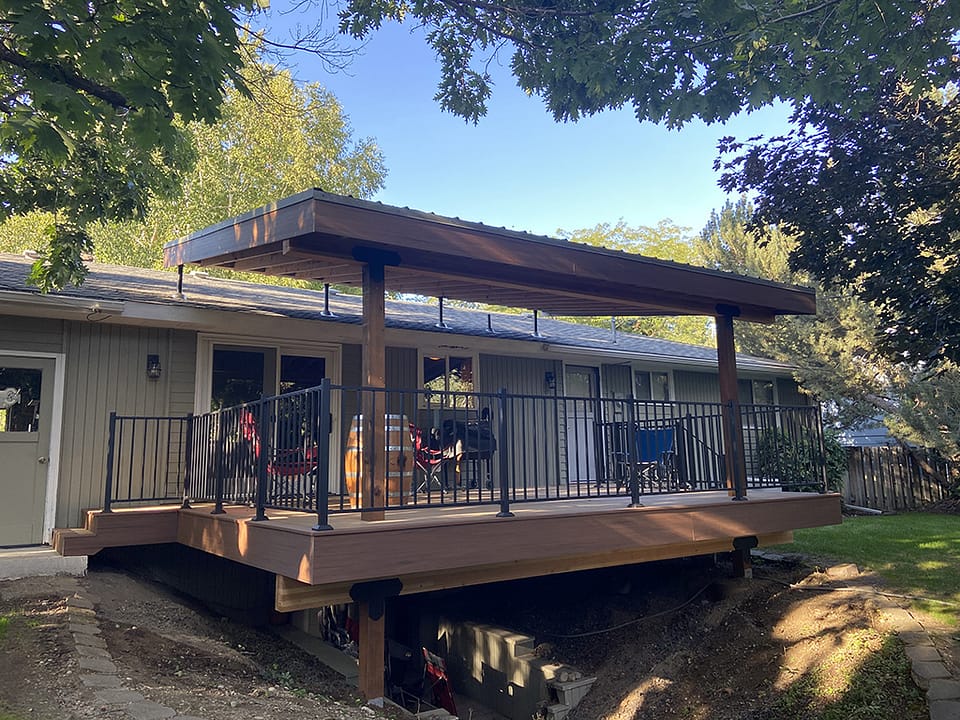 Lean-to roof covering a newly built deck.