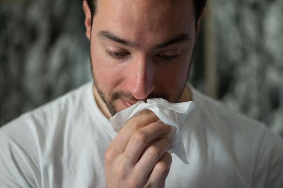 A man seeking a virtual sinus doctor consultation.