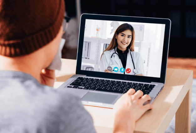 man on video call with female doctor