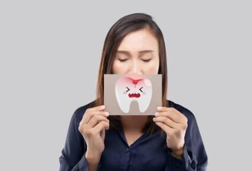 woman with tooth pain cartoon