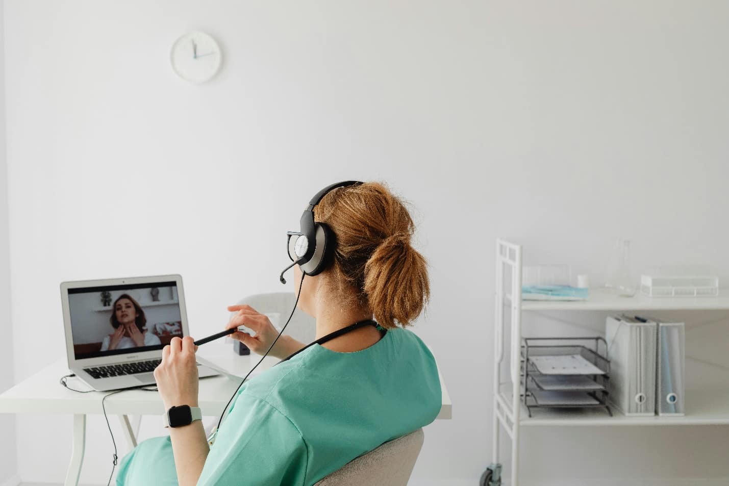 Doctor talking to a patient online