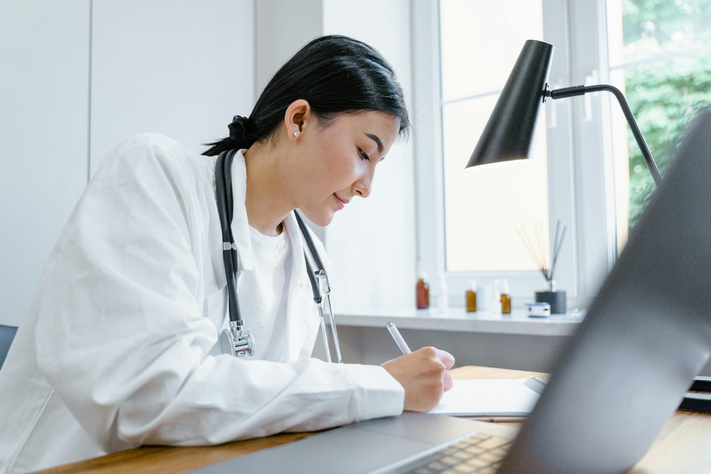 Doctor writing notes
