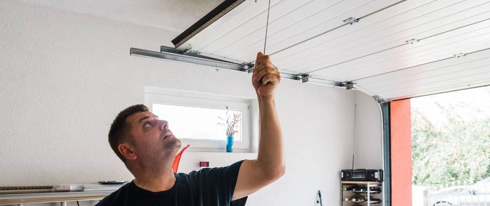 Fixing A Dented Garage Door image